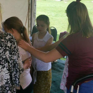 Children praying for one another